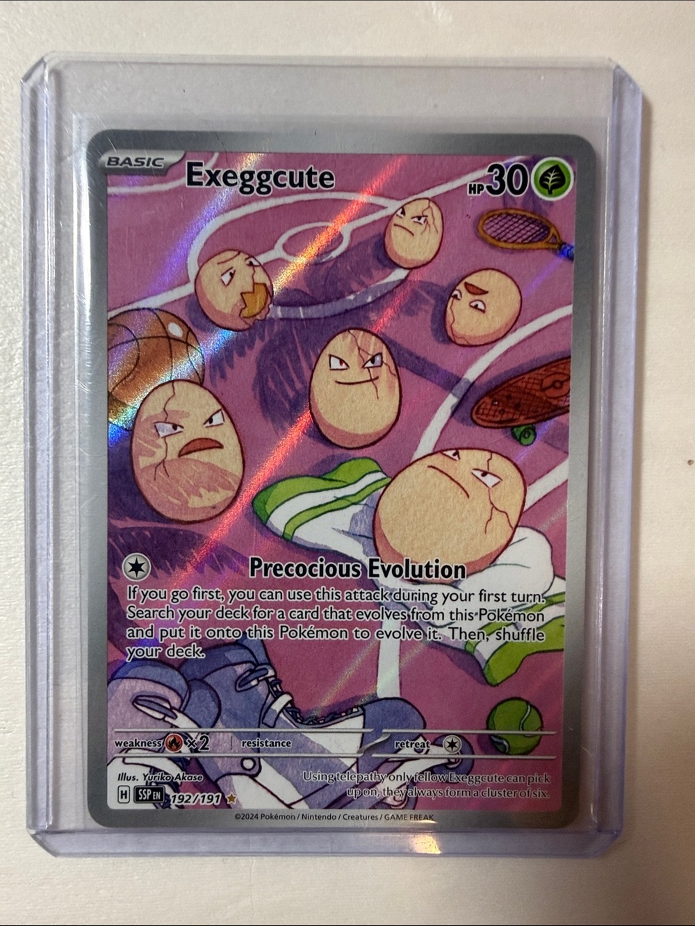Pokemon Exeggcute Holo Pink and Green Card